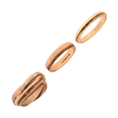 Lot 59 - 9ct three-colour gold 'Russian' wedding band, and two 9ct gold wedding bands (3)