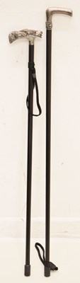 Lot 182 - Two Elizabeth II silver-topped walking sticks