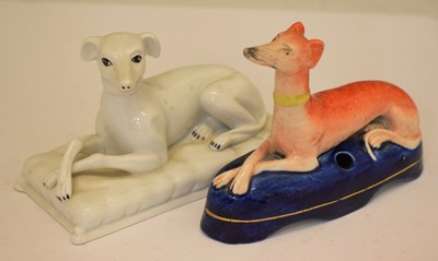 Lot 407 - Victorian Staffordshire penholder modelled as a recumbent greyhound, plus a similar later greyhound