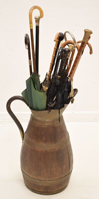 Lot 268 - Early 20th century coopered flagon stick stand and parasols