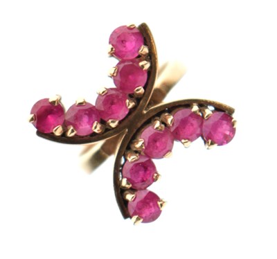 Lot 23 - 9ct gold ring set ten rubies in double 'C' formation