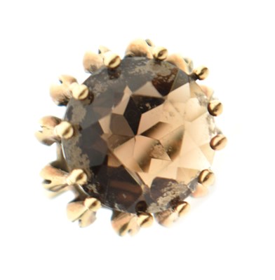 Lot 48 - Modernist 9ct gold dress ring set a large brown stone