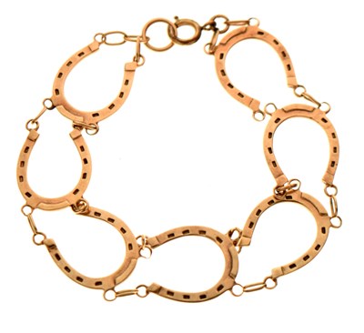 Lot 122 - Vintage 9ct gold lucky horseshoe bracelet (a/f)