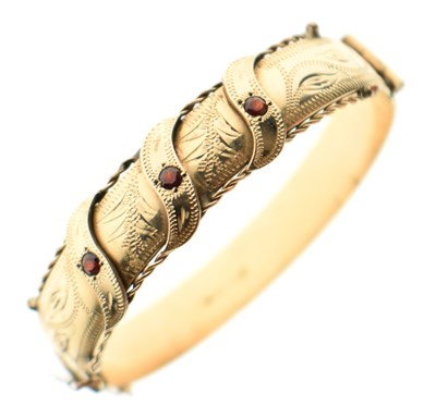 Lot 126 - Rolled gold snap bangle