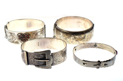 Lot 155 - Four assorted silver bangles