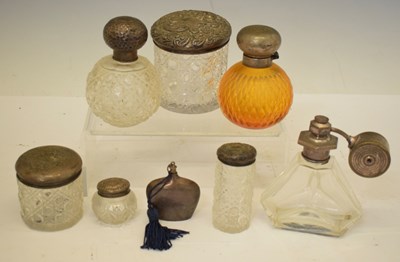 Lot 187 - Group of silver-mounted perfume bottles, silver-topped cut glass dressing table pots, etc