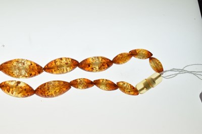 Lot 98 - Amber-coloured bead necklace