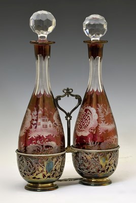 Lot 187 - Pair of Bohemian ruby-flashed etched glass hock decanters