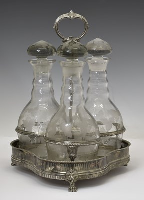 Lot 188 - Set of three etched glass decanters