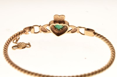 Lot 38 - Unmarked yellow metal Claddagh bangle