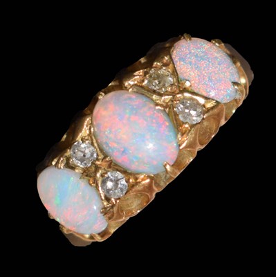 Lot 33 - Opal and diamond 18ct gold ring