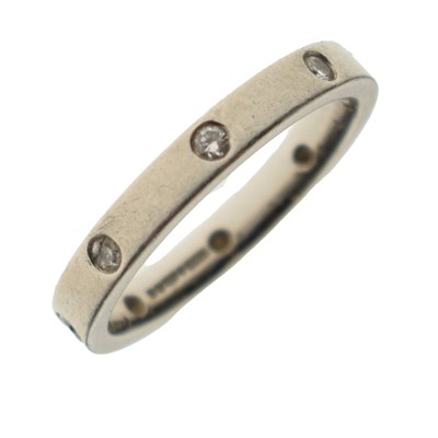 Lot 67 - Diamond set platinum wedding band