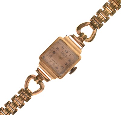 Lot 166 - Titus - Lady's 18k gold cased bracelet watch