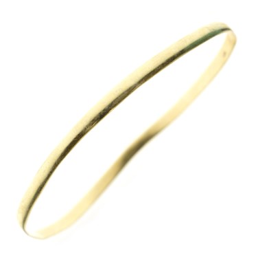 Lot 130 - Yellow metal bangle