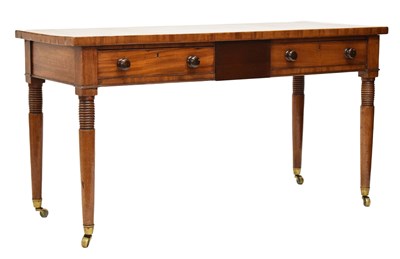 Lot 519 - Early 19th century mahogany three-drawer library or writing table