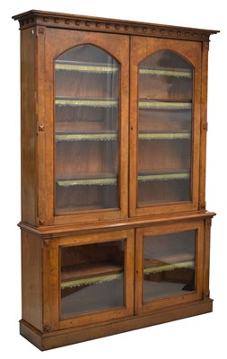 Lot 523 - Mid Victorian Gothic revival figured oak library bookcase