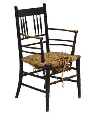 Lot 507 - Late 19th Century ebonised Sussex armchair