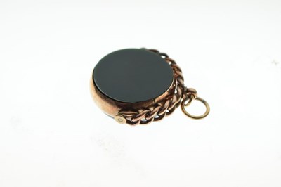 Lot 76 - 9ct gold double sided swivel fob set bloodstone