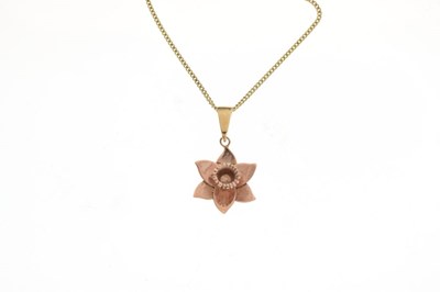 Lot 70 - Clogau 9ct Welsh rose gold daffodil pendant on a 9ct gold curb-link chain