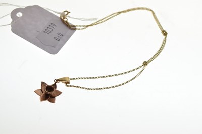 Lot 70 - Clogau 9ct Welsh rose gold daffodil pendant on a 9ct gold curb-link chain