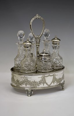 Lot 163 - Hukin & Heath silver plated six-bottle cruet stand