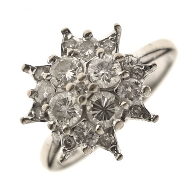 Lot 8 - Diamond white metal cluster ring stamped 18ct