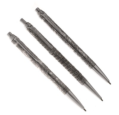 Lot 130 - Three Israeli white-metal retractable ballpoint pens
