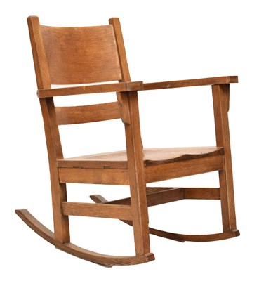 Lot 509 - Manner of Gustav Stickley, early 20th century oak ladder back rocking chair
