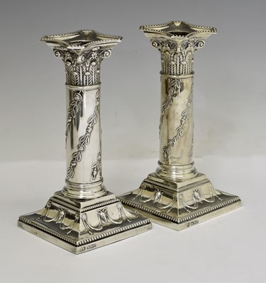 Lot 93 - Pair of late Victorian silver Neoclassical low candlesticks