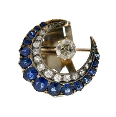 Lot 23 - Early 20th century diamond and sapphire crescent form scarf clip