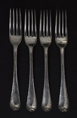 Lot 87 - Set of four George III Old English Feather Edge pattern silver table forks