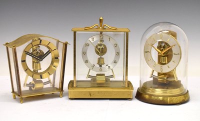 Lot 410 - Three Bulle-type brass cased mantel clocks