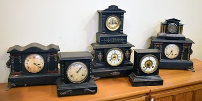 Lot 417 - Seven ebonised mantel clocks