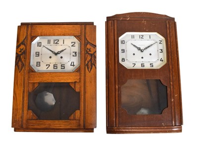 Lot 465 - Two Art Deco oak-cased wall clocks