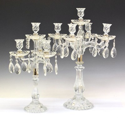 Lot 680 - Two large glass candelabra