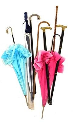 Lot 640 - Bundle of sticks and two parasols