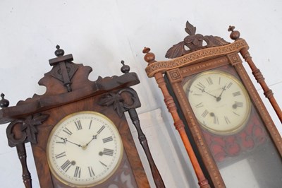 Lot 323 - Two late 19th Century American inlaid walnut wall clocks