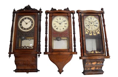 Lot 472 - Three late 19th Century American inlaid wall clocks