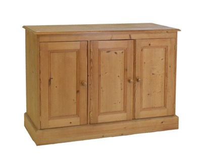 Lot 657 - Pine three-door cupboard