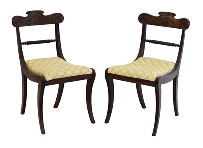 Lot 655 - Pair of Regency sabre leg chairs