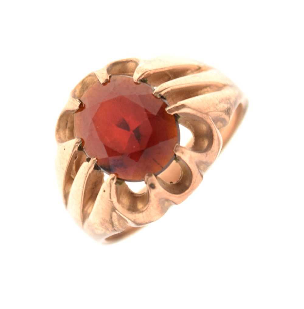 Lot 11 - Gentleman's 9ct gold dress ring set faceted red stone, 7.2 g