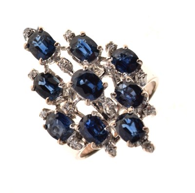 Lot 25 - Sapphire and diamond cluster ring