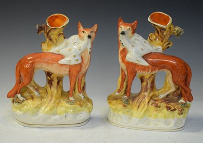 Lot 539 - Pair of Staffordshire fox spill vases