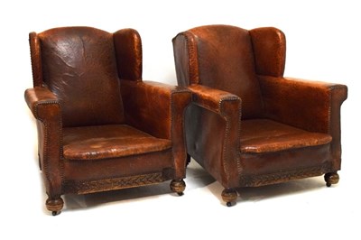 Lot 383 - Pair of 1920s leather club armchairs