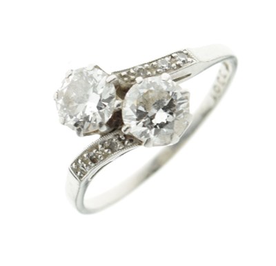 Lot 1 - Two stone diamond crossover ring