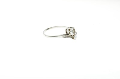 Lot 1 - Two stone diamond crossover ring