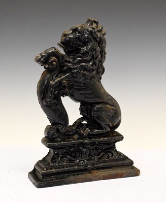 Lot 455 - Cast iron lion door porter