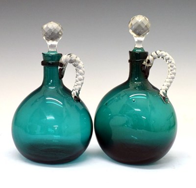 Lot 229 - Pair of green glass carafes