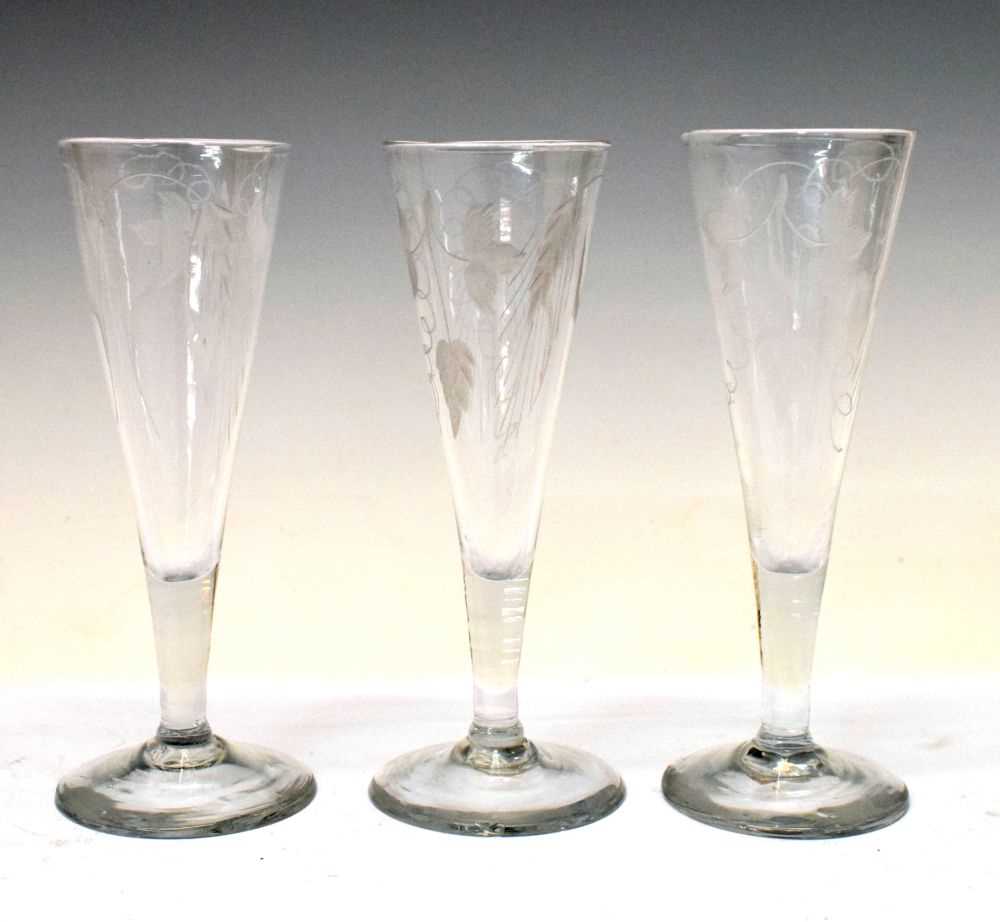 Lot 235 - Three etched hop glasses