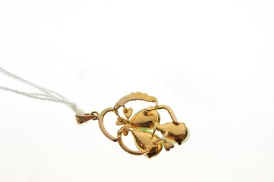 Lot 44 - Yellow metal pendant, stamped '585', set three jade cabochons